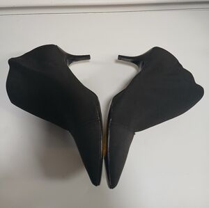 New! All-Over Stretch Asymmetrical Black Women's Ankle Bootie Low Heel NWOT